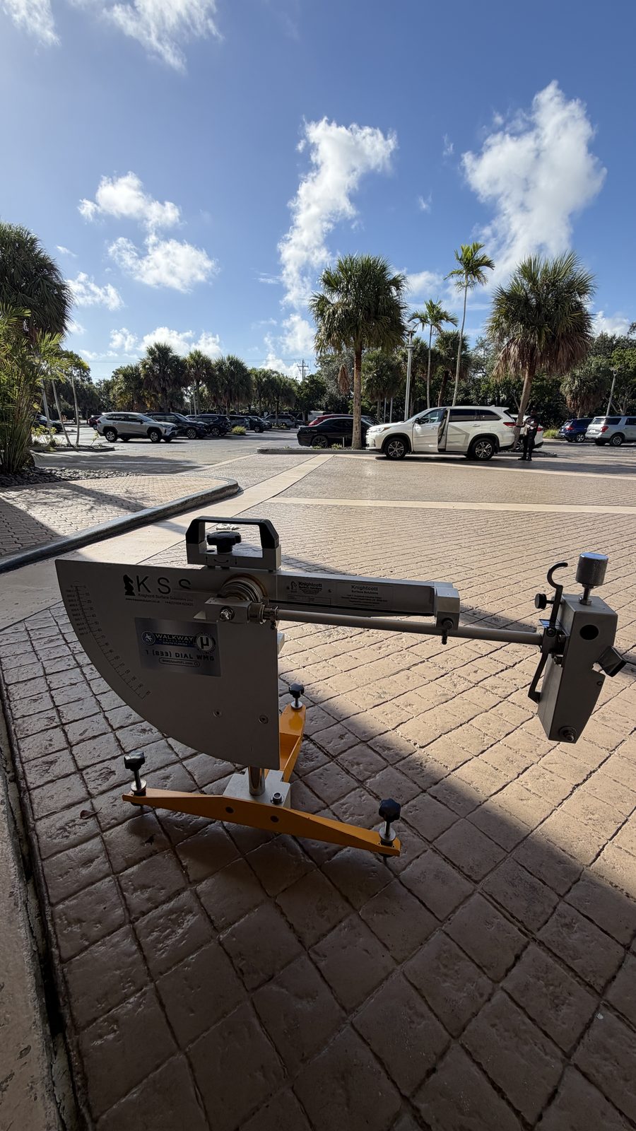 Pendulum Slip Tester on an outdoor paver walkway