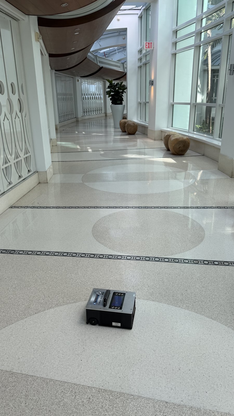 BOT-3000E in a mall atrium.