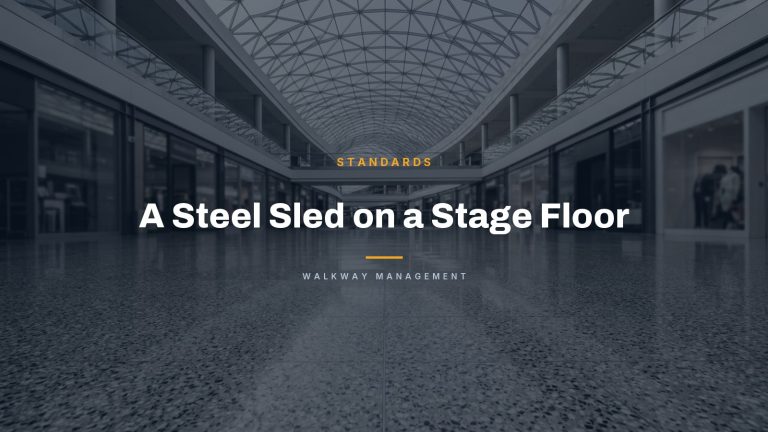 Large reflective floor with the headline A Steel Sled on a Stage Floor